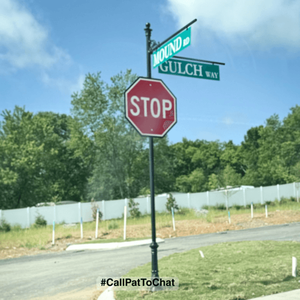 Quiet residential street with homes, sidewalks, and lawns in Smyrna TN